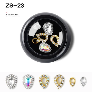 Macro view of ZS-23 alloy nail art charms with crystal rhinestones in various shapes