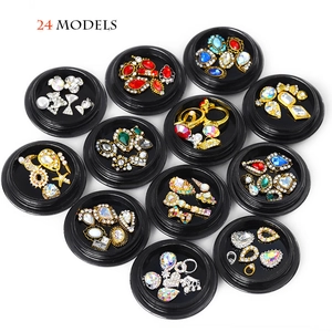 Nail art decoration set with 12 jars of colorful rhinestones and metal alloy charms