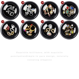 8-pack nail art jewelry set featuring gold crowns pearls and colored rhinestones in pots