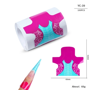 Macro detail of 100pcs nail extension form roll with scale grid for manicure gel nail shaping