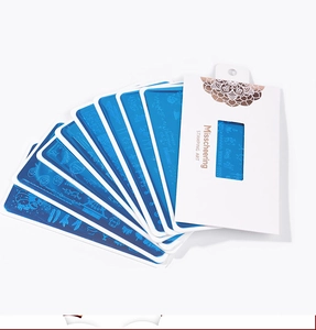 Macro detail of Misscheering Christmas nail stamping plates with festive pattern packaging