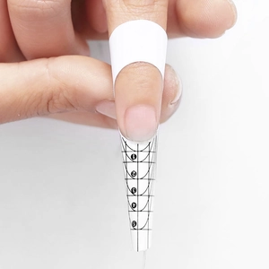 White butterfly nail extension form with black grid scale for professional manicure