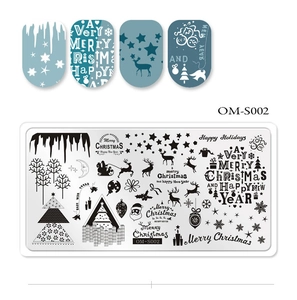 Detail of stainless steel nail stamping plate with Christmas trees and reindeer patterns