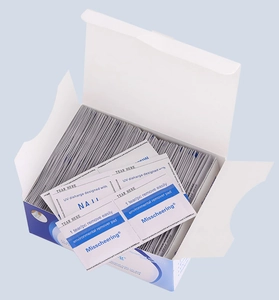 Detail view of Misscheering UV gel remover pads in bulk packaging with blue pouches