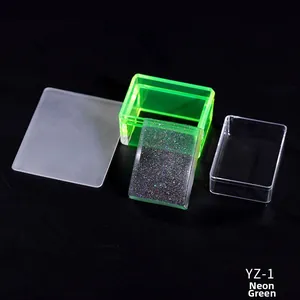 Detailed view of fluorescent green silicone nail art stamper kit with scraper set