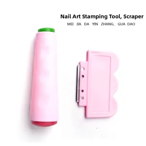 Pink cylinder nail art stamper with red silicone head and matching scraper tool set