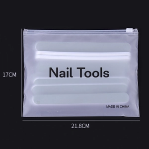 Professional manicure tool kit in a frosted storage bag with nail files and white zipper