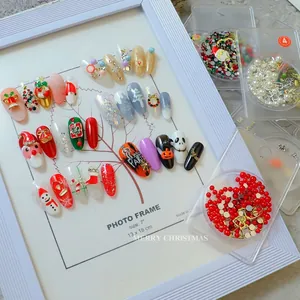 Christmas and Halloween nail art kit with snowflakes, pumpkins, and alloy charms