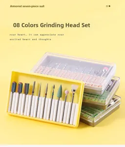 Detailed set of 10 professional alloy and ceramic nail drill bits in a storage box