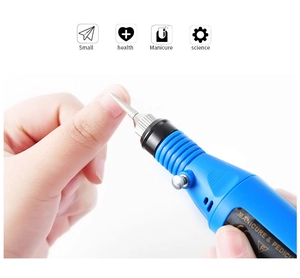 Close-up of bright blue professional electric nail drill filing fingernail with precision