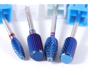 Macro shot of blue coated carbide nail drill bits for cuticle removal and fast gel removal