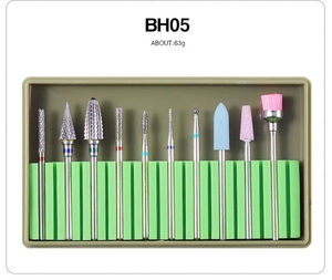 Detailed close-up of a 10-piece alloy and ceramic nail drill bit set with cleaning brush