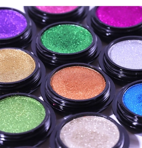 Macro shot of multi-color solid mirror nail powder set with metallic chrome finish