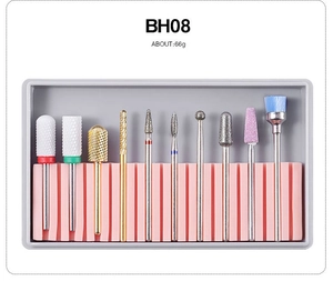 Detailed set of 10 professional alloy and ceramic nail drill bits in a storage box