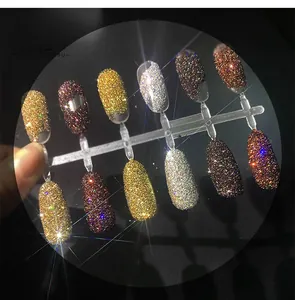 Detailed view of six-color crystal diamond nail glitter powder on display tips