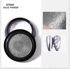 Macro view of solid silver titanium mirror nail powder with smooth metallic finish
