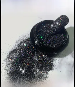 Macro shot of JZ01 holographic black nail glitter powder in a round glass bottle