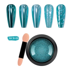 Détail macro du kit poudre à ongles miroir sarcelle avec applicateur et effets