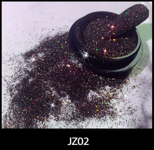 Macro shot of dark sparkling nail art glitter powder JZ02 with iridescent starlight effect