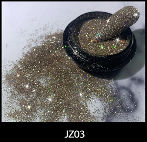Macro shot of sparkling champagne gold nail glitter powder on marble with swatch