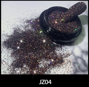 Macro shot of dark glitter nail powder JZ04 with rainbow sparkles and sample nail