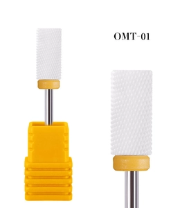 Detail of OMT-01 ceramic nail drill bit with coarse cylindrical teeth and yellow base