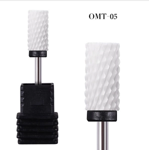 Macro detail of OMT-05 white ceramic nail drill bit with spiral texture and metal shank