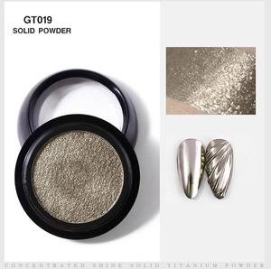 Macro detail of GT019 gold solid mirror nail powder with metallic ripple effect