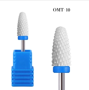 Detailed view of OMT-10 white ceramic nail drill bit with fine cross-cut teeth for manicure