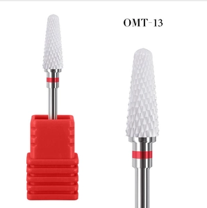 Detail of OMT-13 cylindrical ceramic nail drill bit with red band on white background