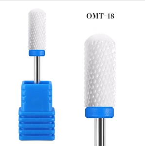 Macro detail of OMT-18 ceramic nail drill bit with fine cutting teeth and blue base