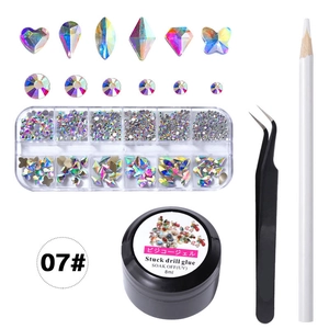 12-grid nail art set with AB rhinestones, UV glue, tweezers, and dotting pen for DIY designs