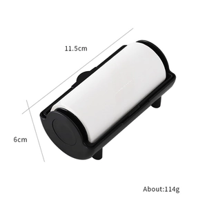 Macro shot of handheld lint roller showing 11.5cm length and 6cm height specifications