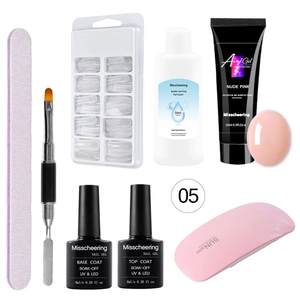 Nude pink poly nail gel kit with UV lamp, dual-ended brush, and nail extension tools