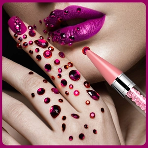 Dual-head acrylic nail dotting tool with wax tip and pink crystal handle and rhinestones