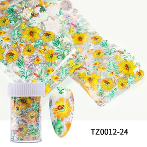 Detail of yellow daisy floral nail art transfer foil with metallic laser finish and storage jar