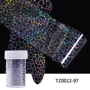 Detail of silver laser honeycomb nail art transfer foil and holographic glitter set