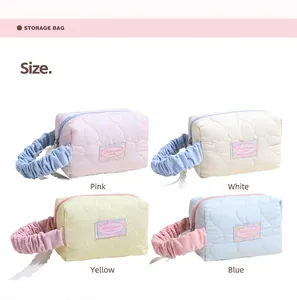 Beauty case trapuntati a cuore in colori pastello con manici a volant per ragazze