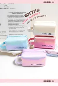 Detailed view of holographic laser makeup bags in four gradient colors with zip closure