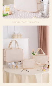 Detail of cream checkered cosmetic bags in various sizes with textured fabric