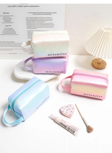 Detail showing the portable holographic makeup bag with smooth zipper and fabric handle