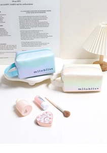 Close-up of holographic laser makeup bag showing gradient finish and side handle