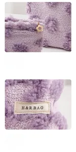 Detail of purple teddy velvet cosmetic bag with golden flower zipper and woven label