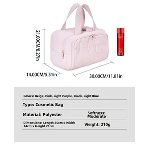 Quilted pink makeup bag dimensions detail showing 30x14x21cm size and spacious sections