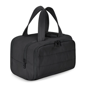 Quilted black travel cosmetic bag with dual handles and spacious multi-compartments