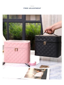 Close-up of diamond quilted PU leather texture and wide carry handle on cosmetic case