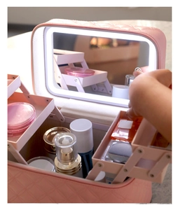 Pink quilted PU leather makeup organizer with LED mirror and tiered folding storage trays