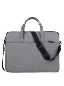 Vue détaillée du sac d'ordinateur gris avec tissu texturé et bandoulière réglable