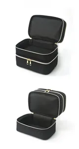 Internal double-layer storage of black quilted cosmetic bag with gold zippers
