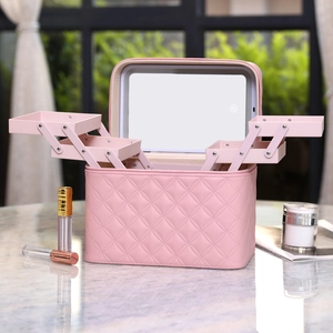 Pink quilted PU leather makeup train case with multi-tier trays and LED lighted mirror